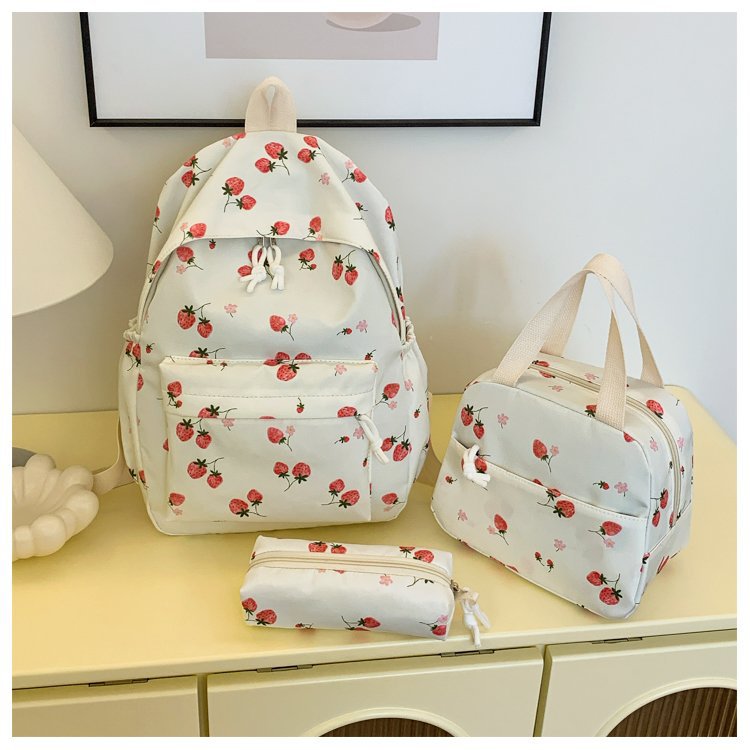 Backpack set with cheerful strawberry pattern and practical compartments Stornfield