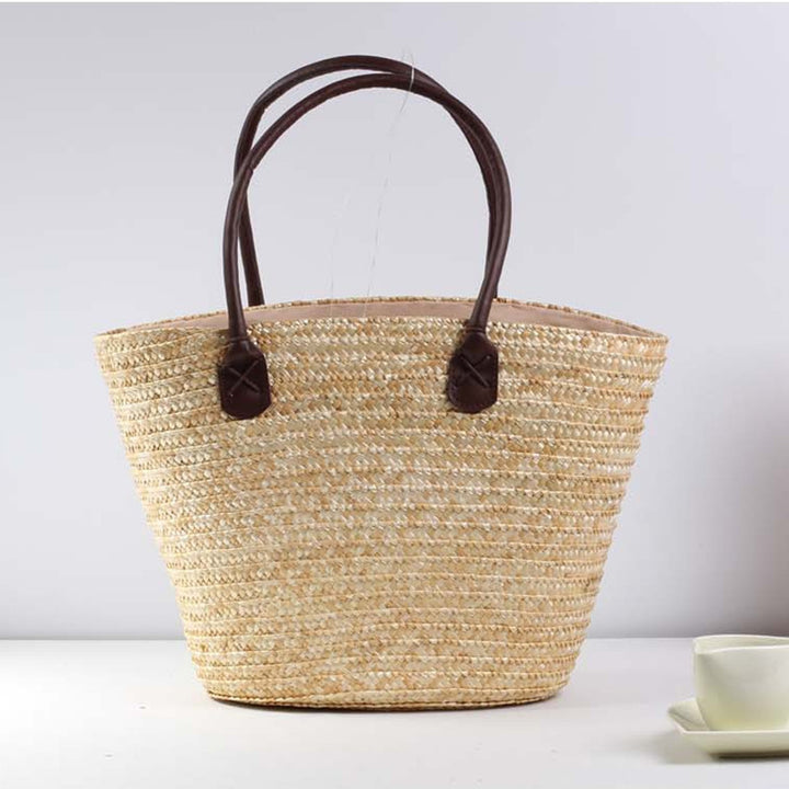 Braided beach bag with colorful embroidery pattern Stornfield