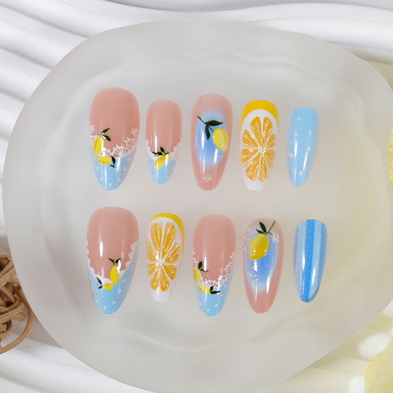 Artificial nail set with cheerful citrus and flower motifs Stornfield
