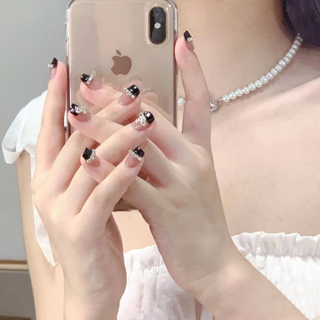 Glamorous nail art with rhinestone embellishments Stornfield