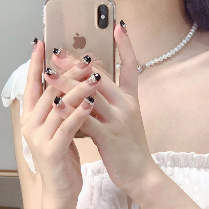 Glamorous nail art with rhinestone embellishments Stornfield