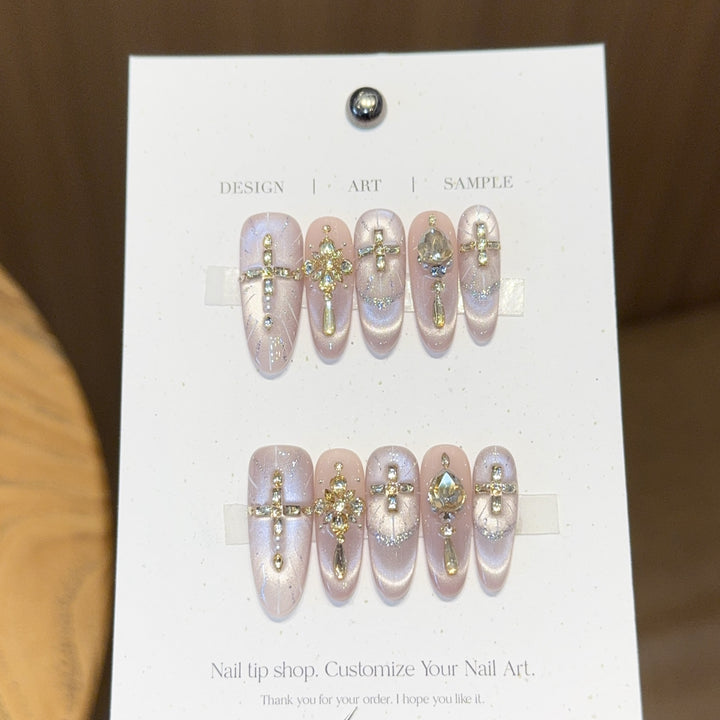 Artificial nails with elegant rhinestone and glitter details Stornfield