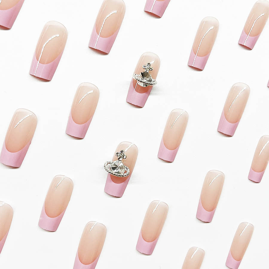 Acrylic nail set with luxurious floral and rhinestone decorations Stornfield