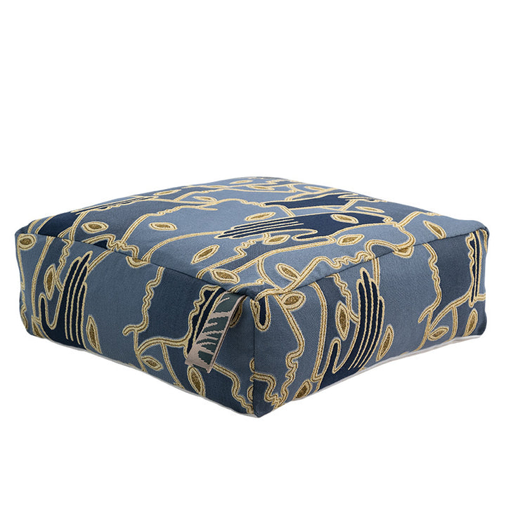 Square floor cushion cover with embroidered line pattern and carrying handle