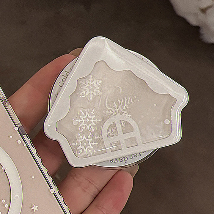Fragrant candle in Winter House design Stornfield