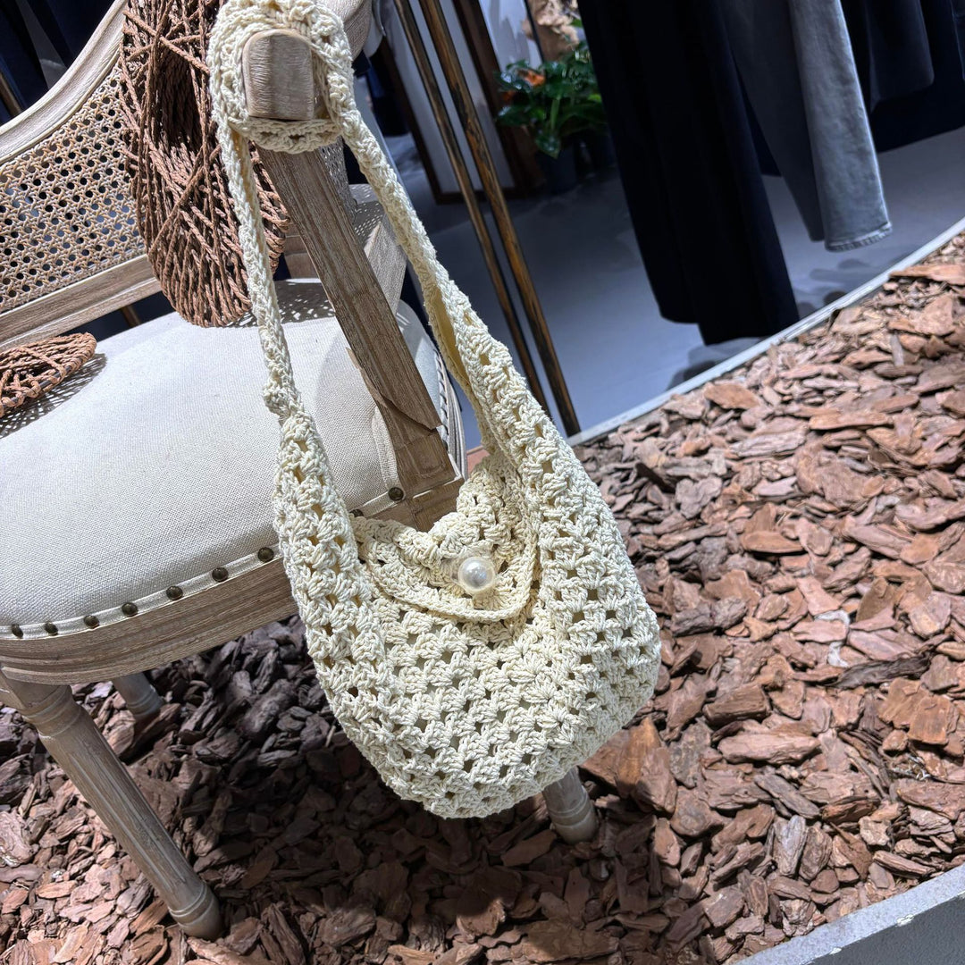 Handmade shoulder bag with bead closure Stornfield