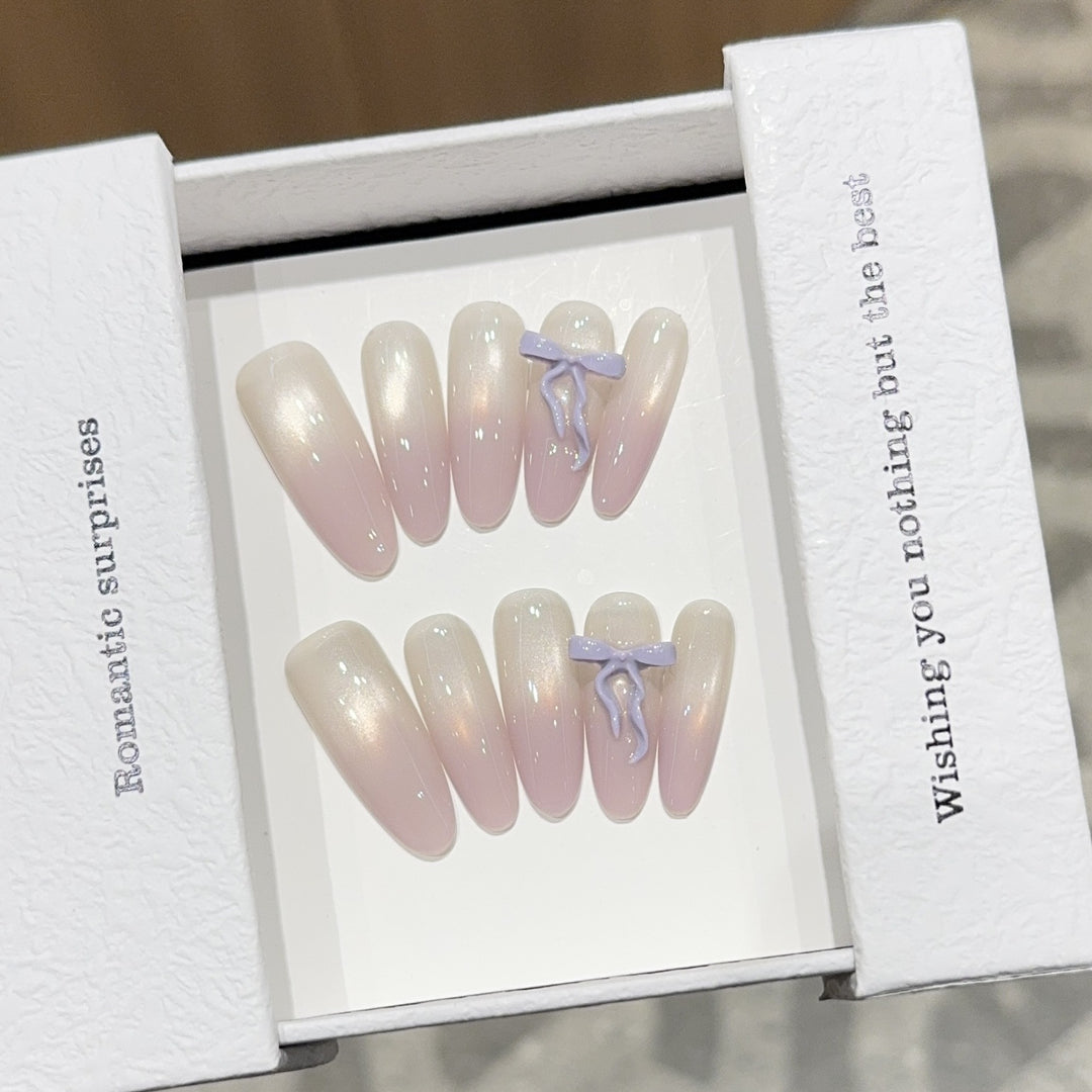 Artificial nails with romantic design and shimmering accents Stornfield