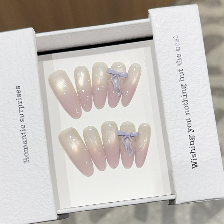 Artificial nails with romantic design and shimmering accents Stornfield