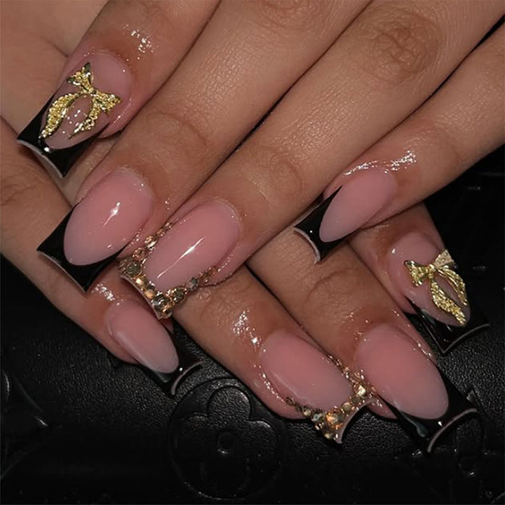 Artificial nail set with elegant gold decoration and stylish black Stornfield