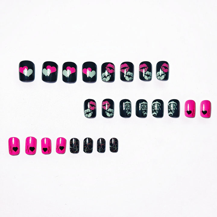 Acrylic nail design with hearts and kiss motifs Stornfield