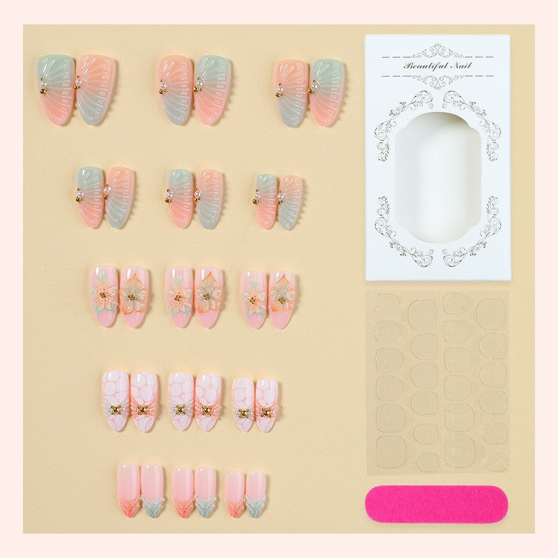 Artificial nail set with glamorous flower and glitter details Stornfield