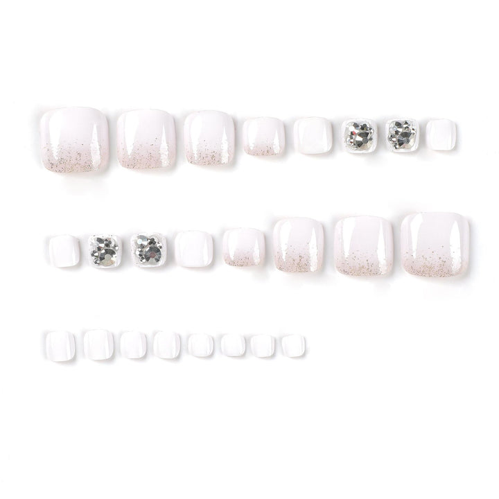 Artful toenail design with sparkling embellishments Stornfield