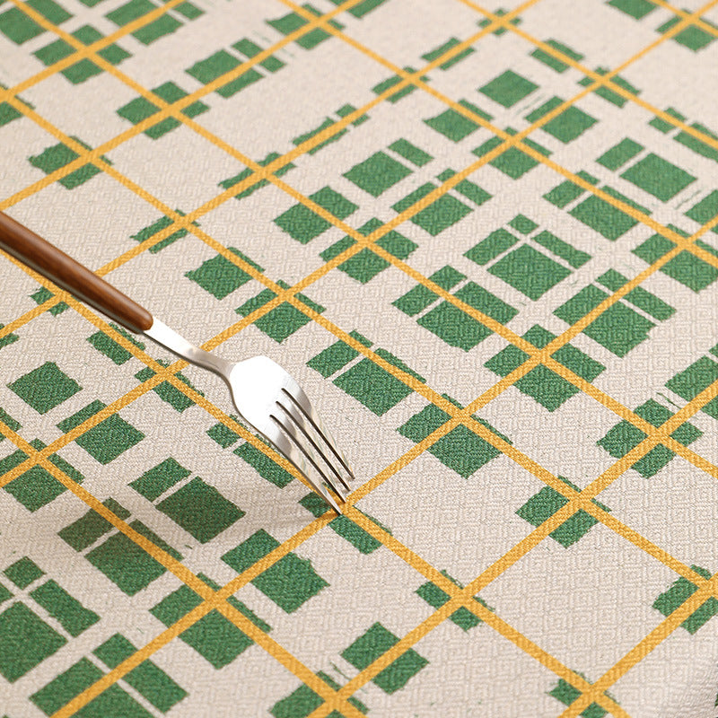 Rectangular coated tablecloth with checked plaid pattern and water-repellent surface Stornfield