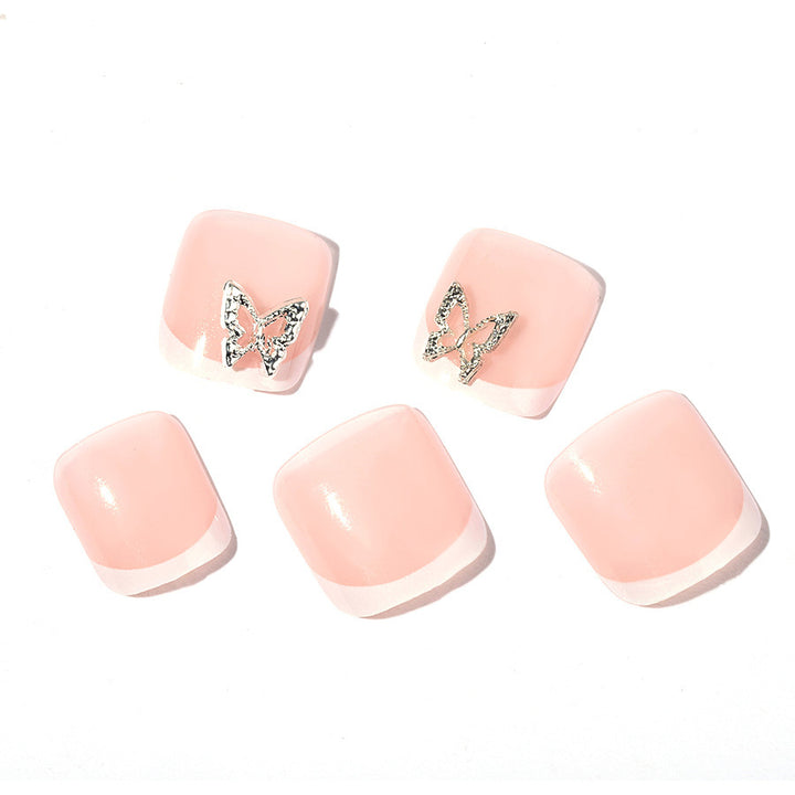 Artificial nail set with delicate decorations and glitter designs Stornfield