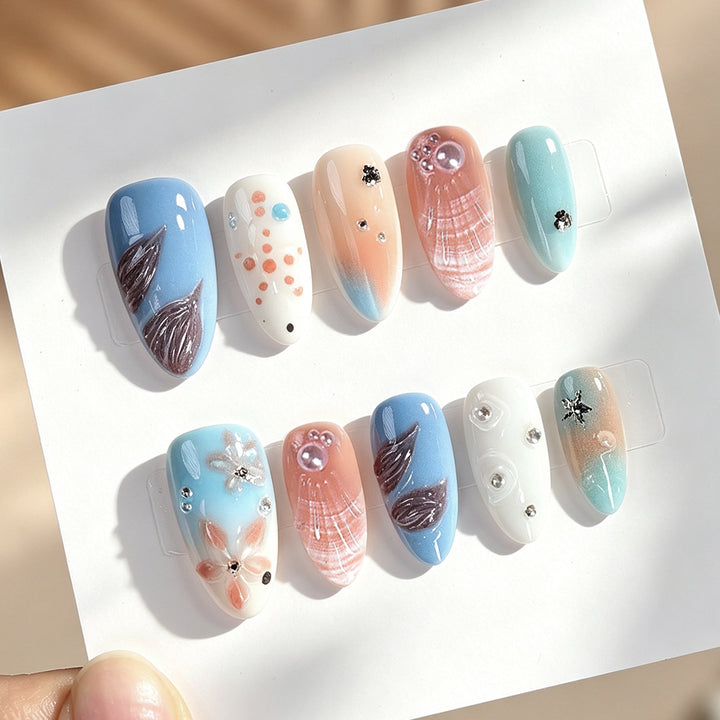 Creative nail art set with delicate floral and maritime designs Stornfield