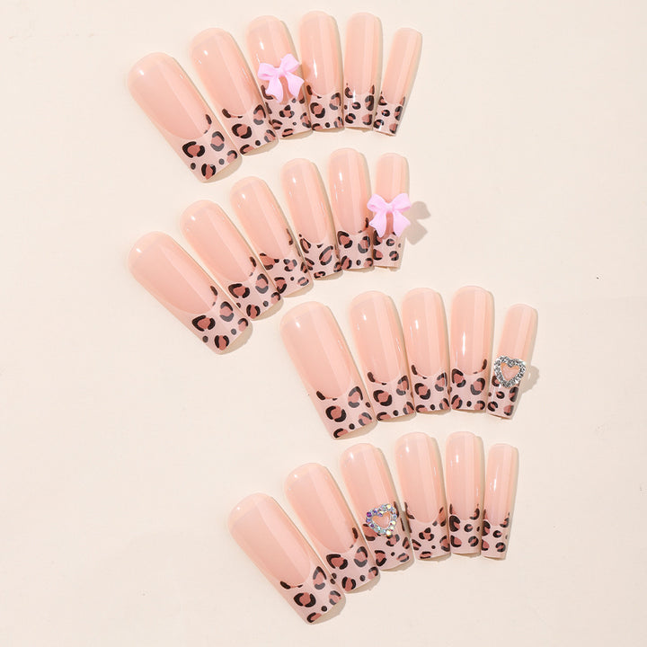 Artistic Press-On Nail Kit with Charming Leopard and Bow Designs Stornfield