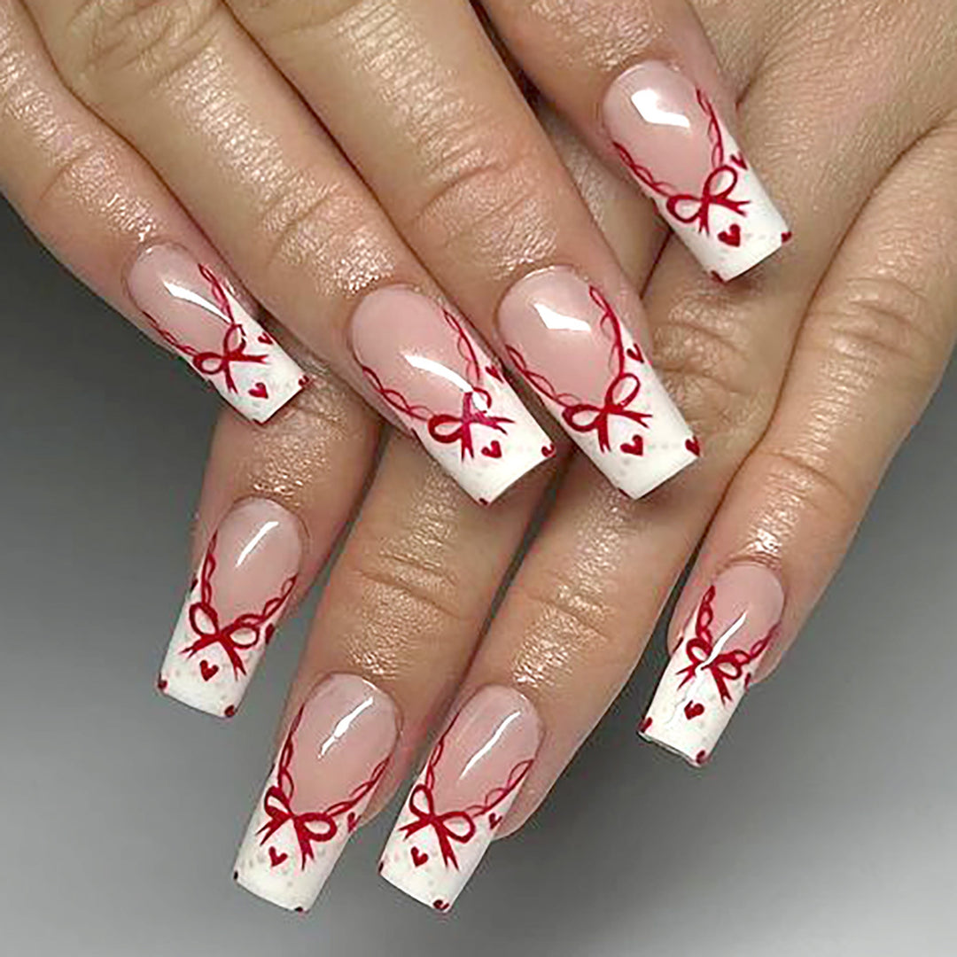 Decorative Long Press-On Nail Set with Bow and Heart Design Stornfield