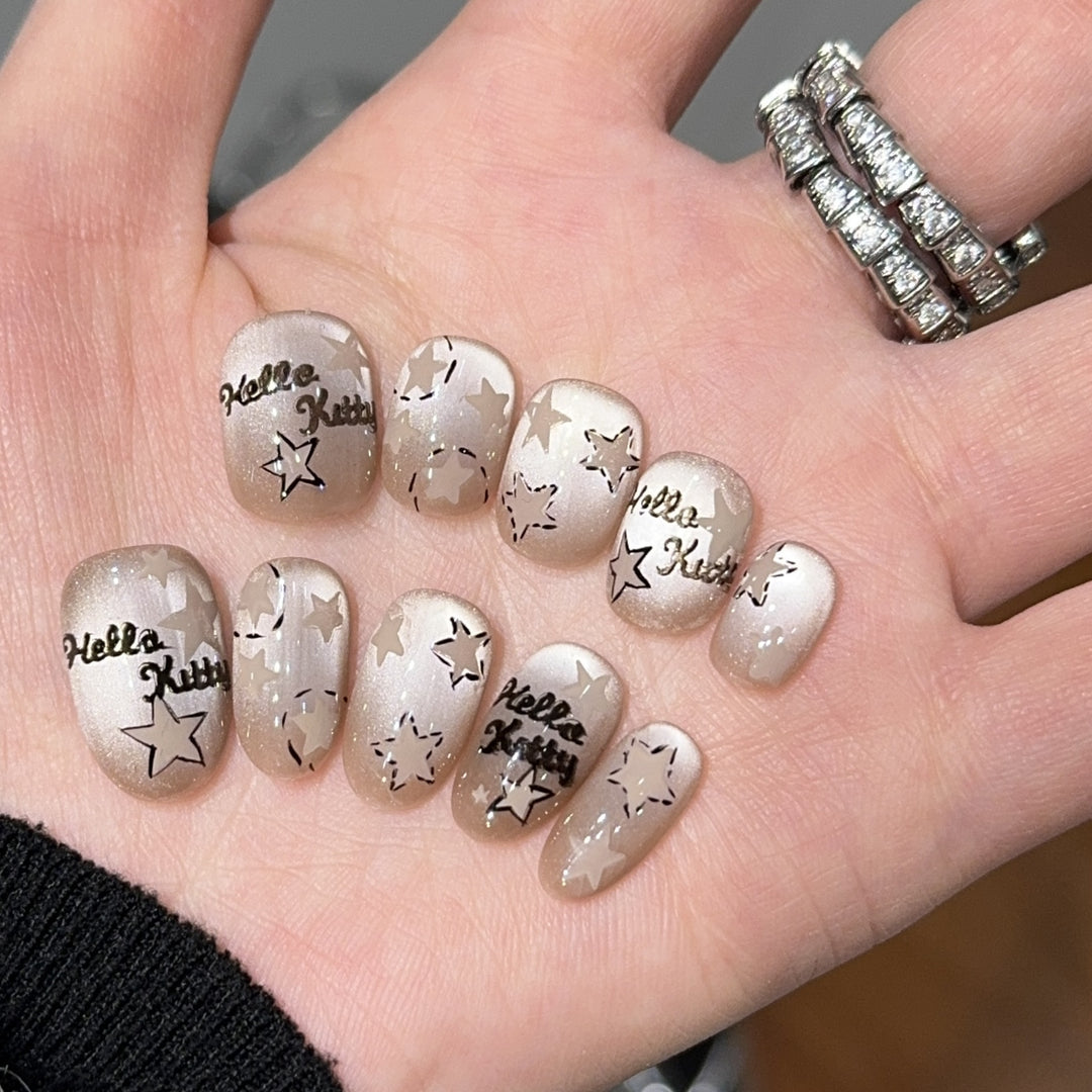 Artificial nail tips with Hello Kitty design Stornfield