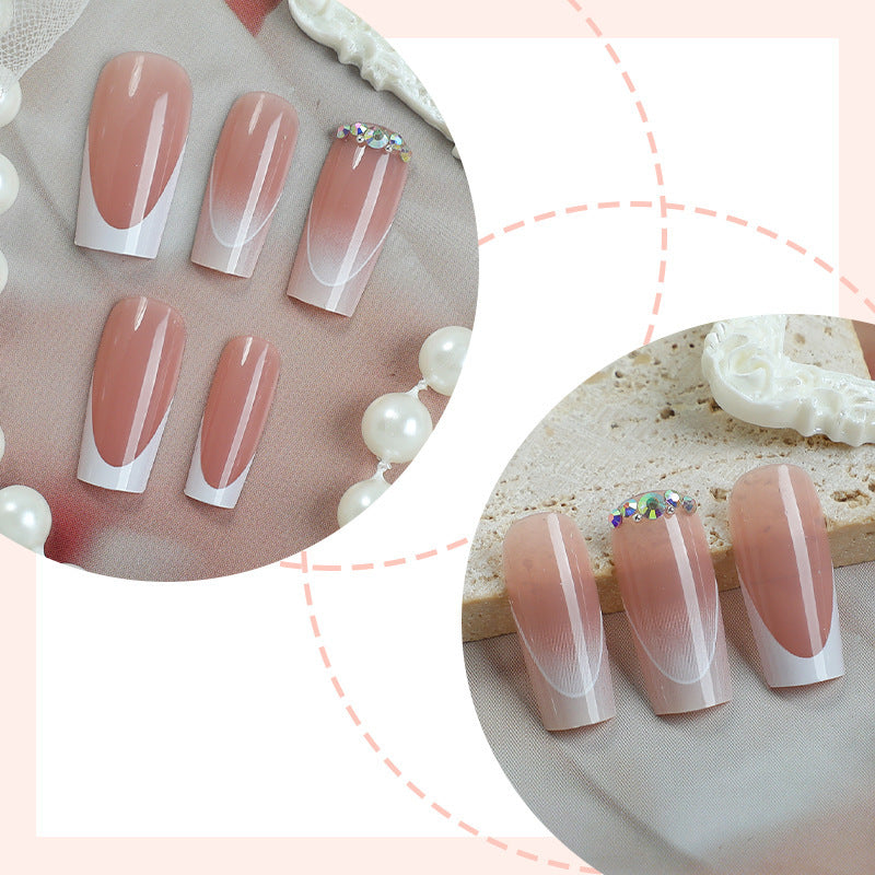 Artificial nail set with elegant ombre accents and seductive rhinestones Stornfield