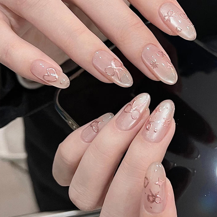 Elegant Artistic Press-On Nail Art with Bow & Heart Designs Stornfield