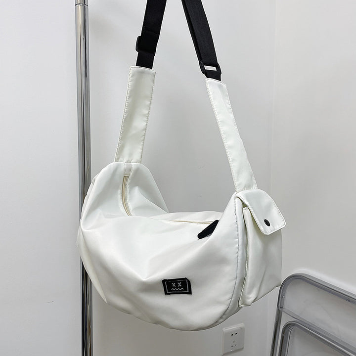 Sporty shoulder bag with adjustable carrying strap Stornfield