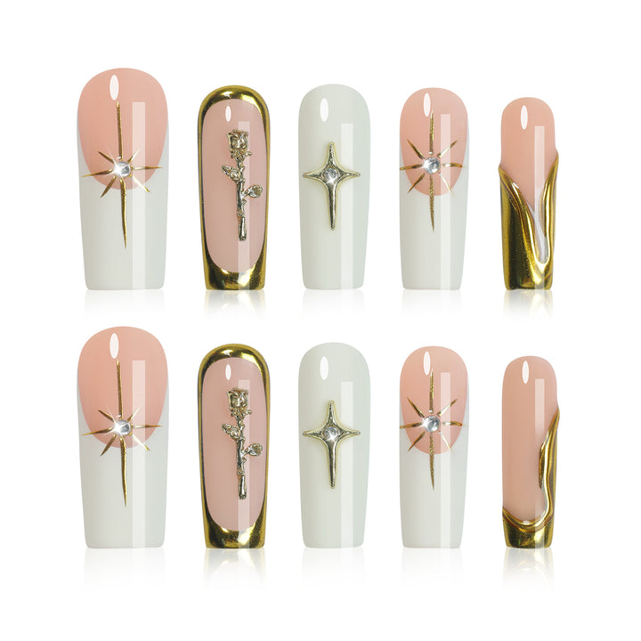 Creative nail art set with golden accents and floral details Stornfield