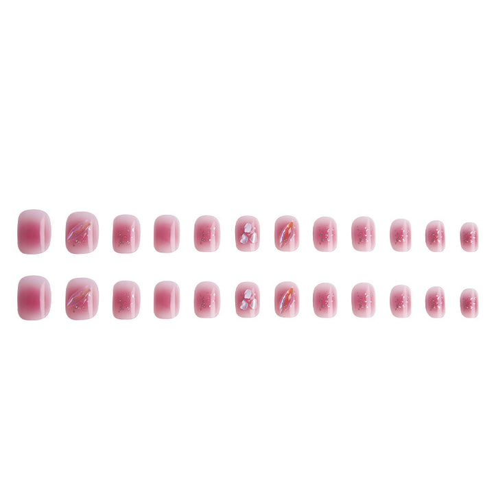 Artificial nails with delicate glitter design and floral accent Stornfield