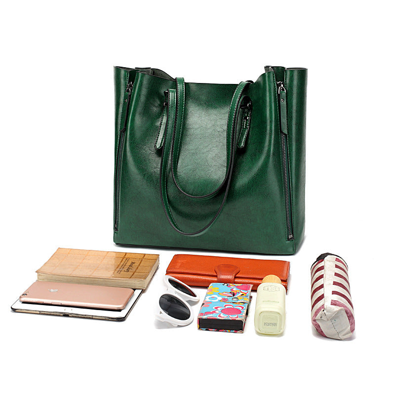 Versatile Leather Tote Bag with Zippered Pockets