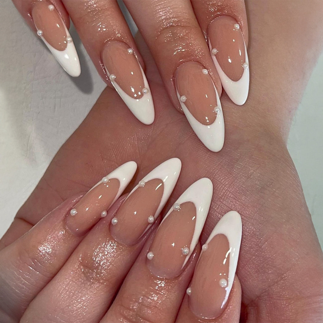Artificial nail set with elegant tips and pearl decorations Stornfield