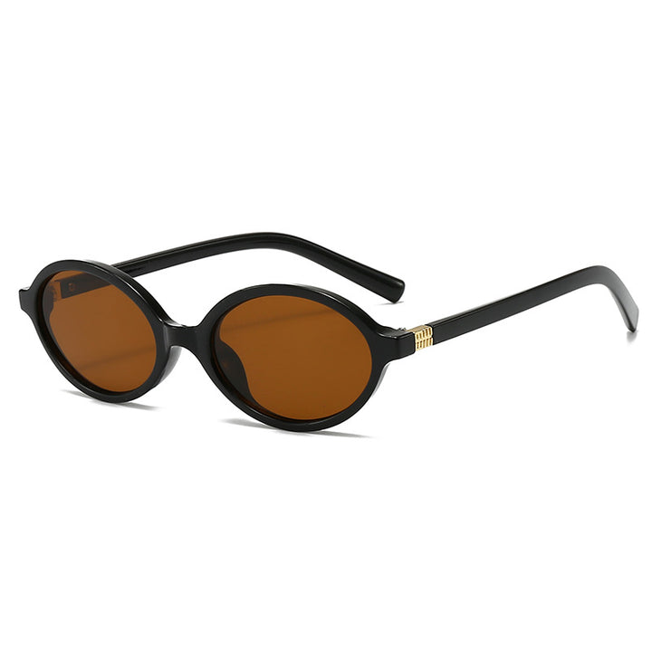 Women's fashionable oval glasses with golden accents Stornfield