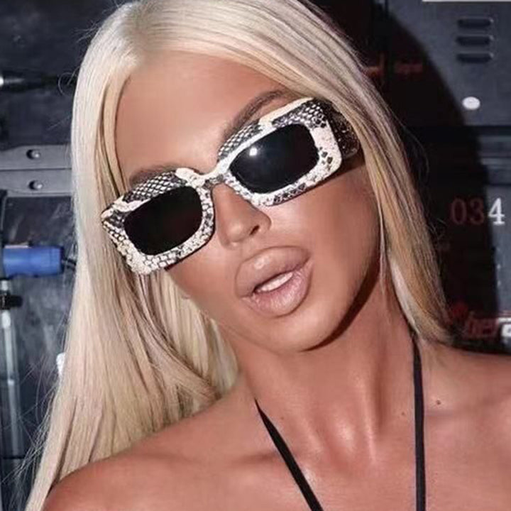 Women extravagant sunglasses with striking snake pattern Stornfield