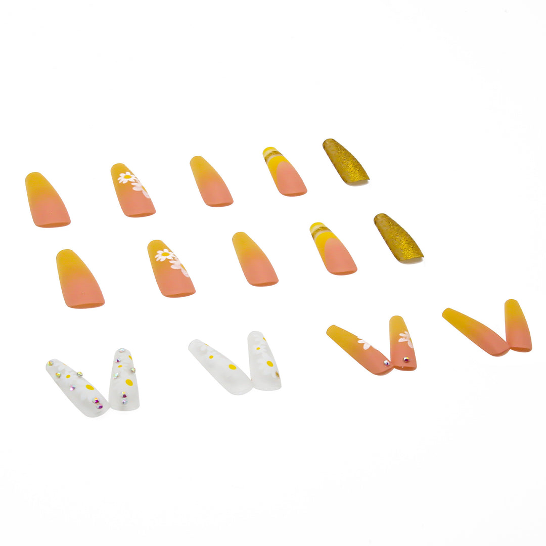 Artificial nail set with colorful sunflower designs and glittering accents Stornfield