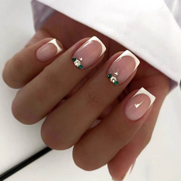 Art nail set with elegant French design and glittering accents Stornfield