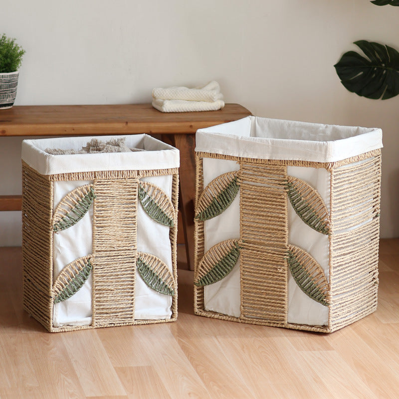 Elegant laundry basket made of natural wicker with fabric lining Stornfield