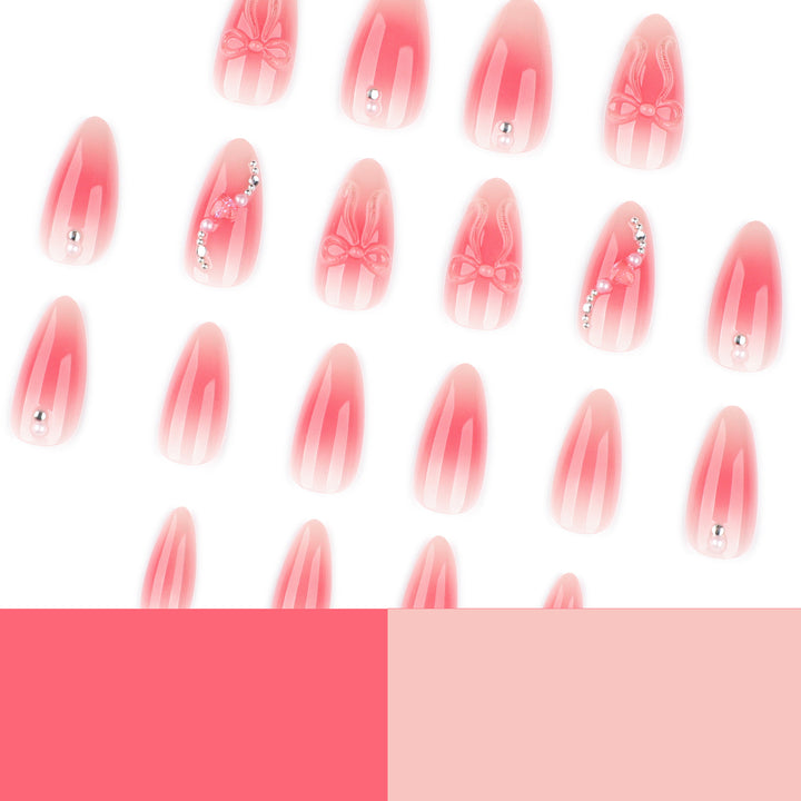 Artful nail extensions with delicate floral accents and glitter Stornfield