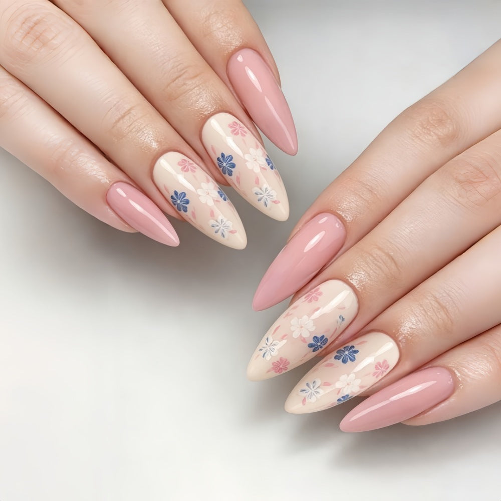 Stylish almond-shaped artificial nails with floral patterns Stornfield