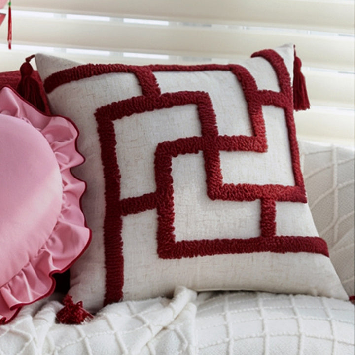 Heart-shaped decorative pillow with ruffled trim and embroidered inscription Stornfield