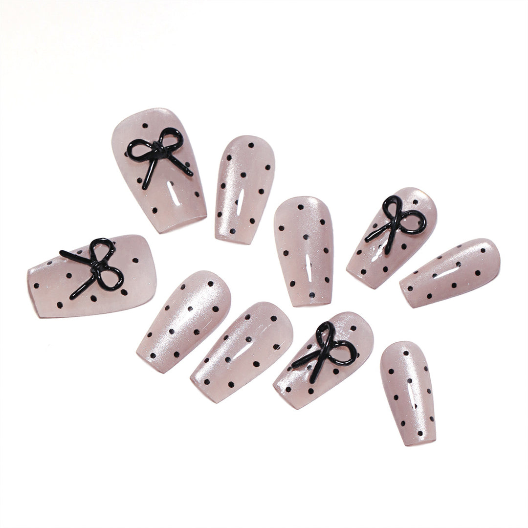 Artful Nail Extensions with Bow Pattern Stornfield