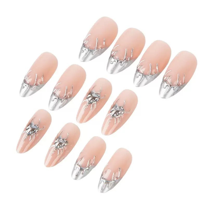 Creative Nail Art with Stylish Metallic Finish Stornfield