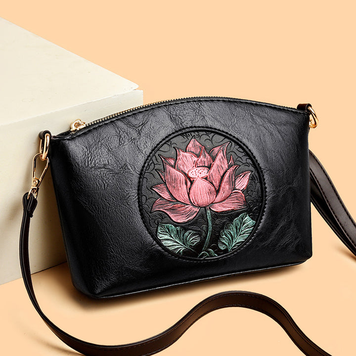Embossed Floral Clutch Bag
