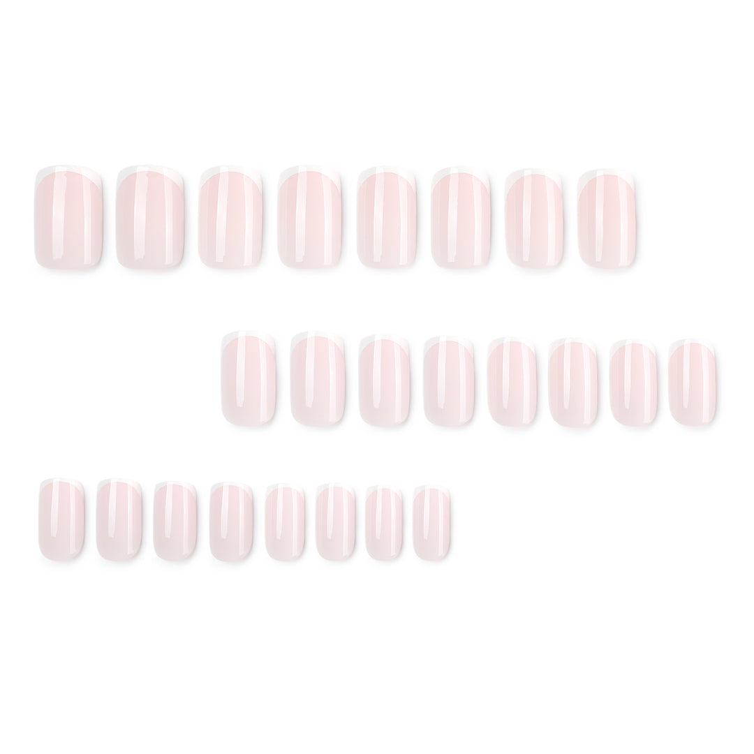 Classic nail extensions with elegant French tips Stornfield