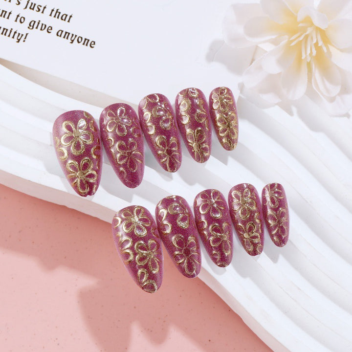 Glittering artificial nails with floral patterns Stornfield