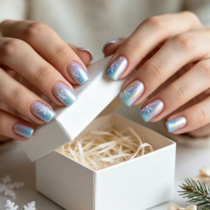 Wintry Artistic Nails with Shimmering Snowflake Design Stornfield