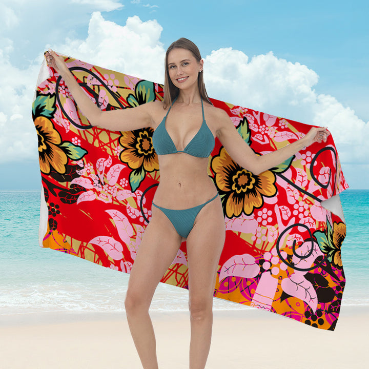 Beach towel with vibrant tropical plant motif Stornfield