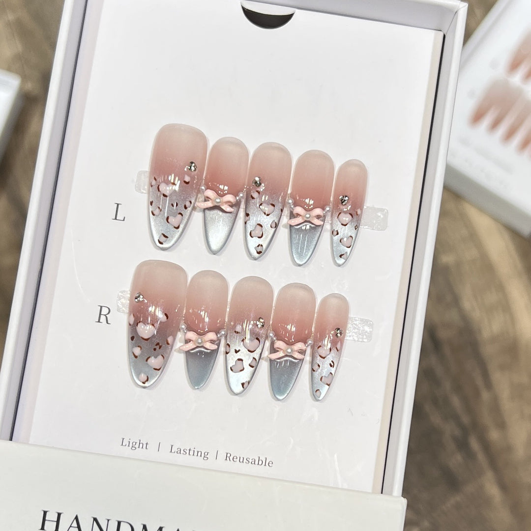 Decorative Press-On Nail Design with Bow Accents Stornfield