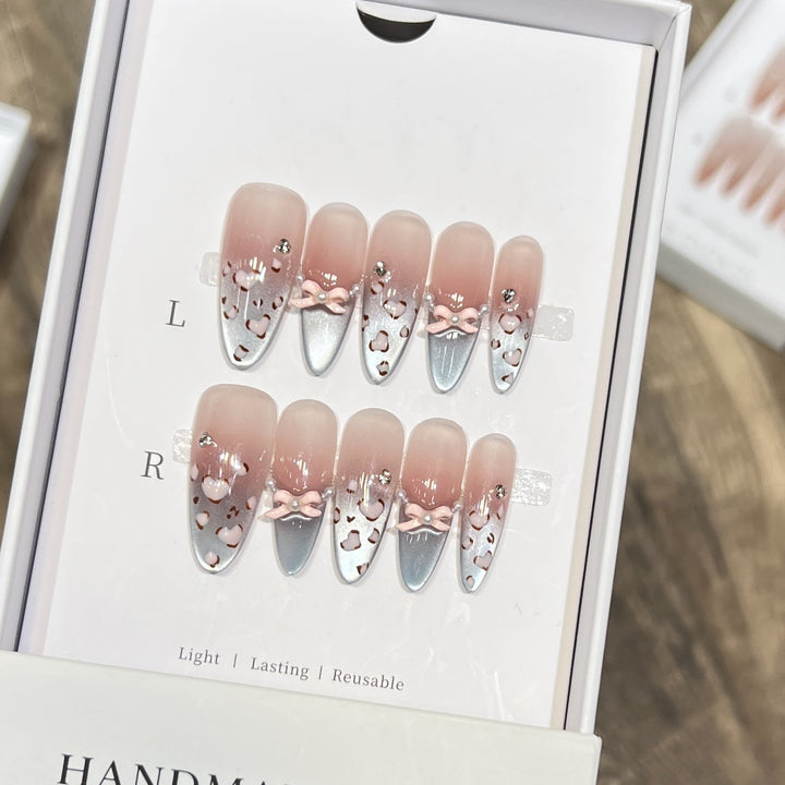 Decorative Press-On Nail Design with Bow Accents Stornfield