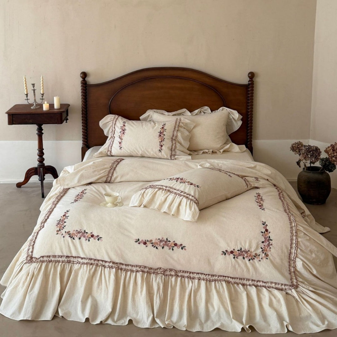 Romantic bedding set with ruffles and floral embroidery in linen look