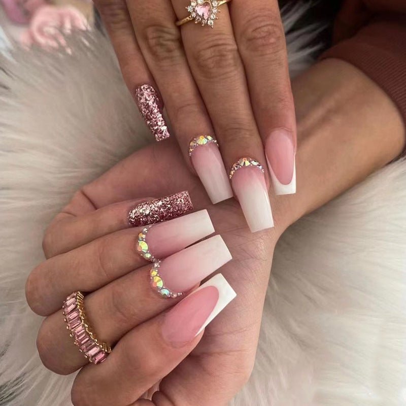 Glamorous artificial nails with rhinestone accents Stornfield