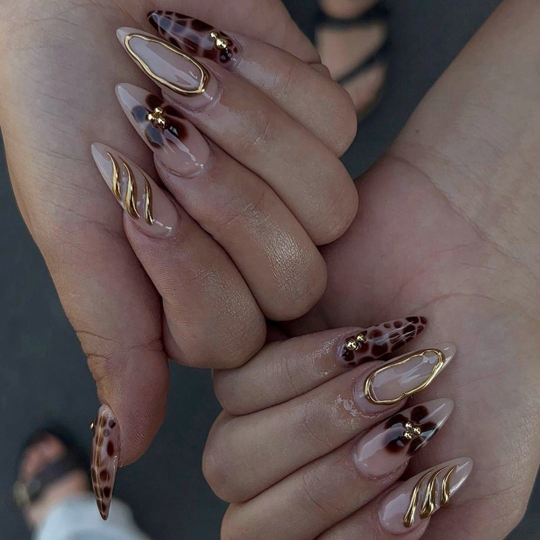 Nail art set with luxurious 3D decorations and golden accents Stornfield