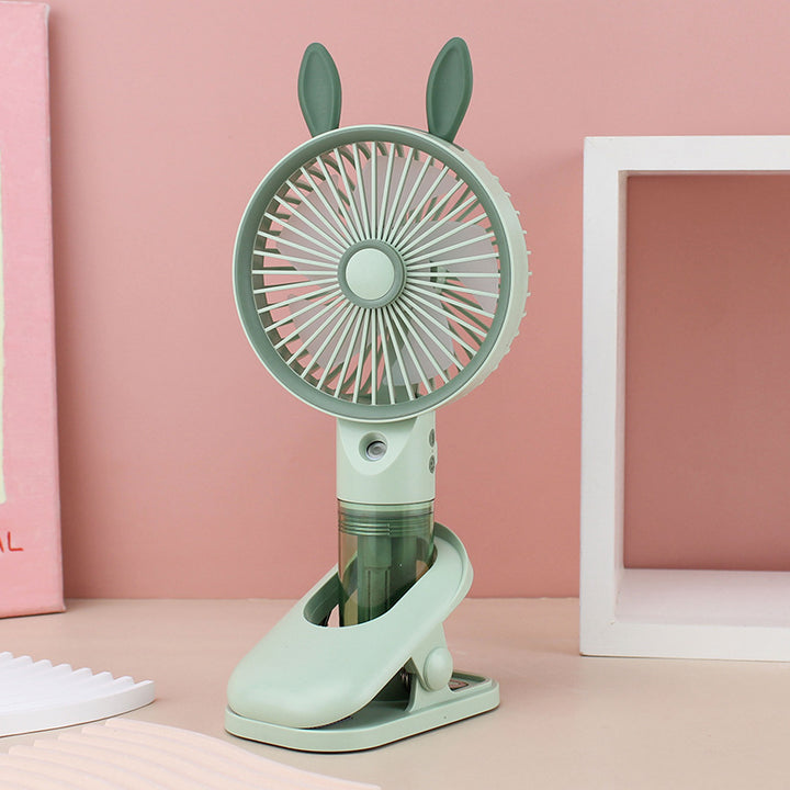 Cooling compact rechargeable clip-on misting handheld fan with detachable water reservoir and adjustable tilt Stornfield